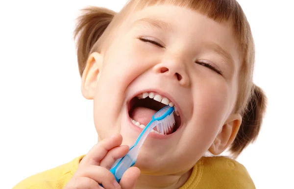 Мила дитина з зубною щіткою — стокове фото
