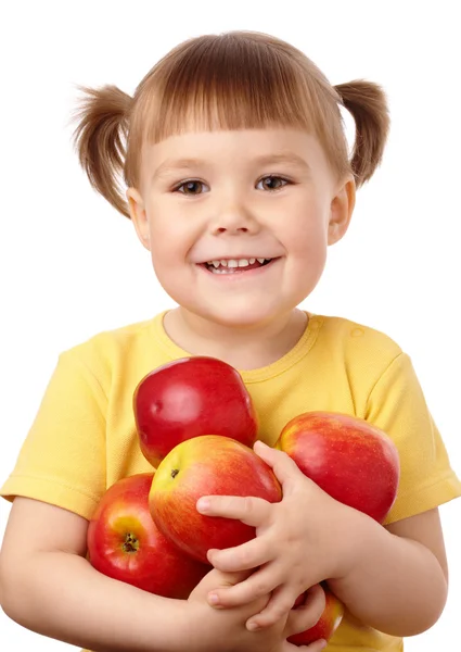 Симпатичный ребенок с яблоками — стоковое фото