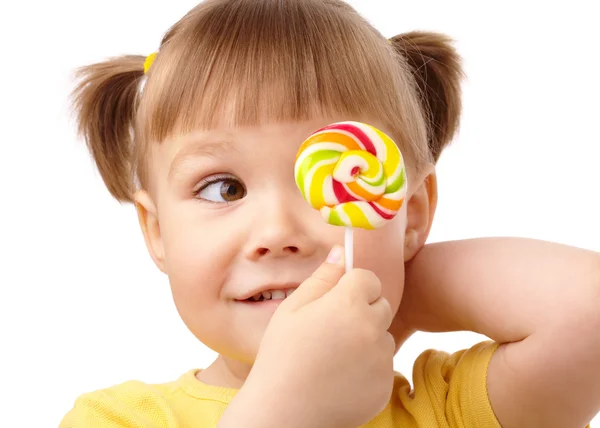 Little girl with lollipop Stock Photo