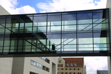 going into the glass walkway clipart