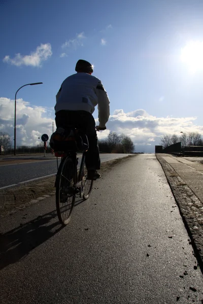 stock image Cyclists to work in the morning sun