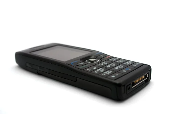 Black mobile phone isolated on white — Zdjęcie stockowe