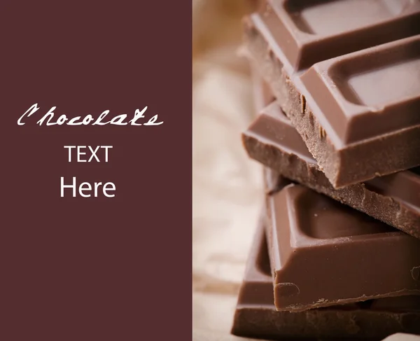 Pyszne czekolady z przykładowy tekst — Zdjęcie stockowe