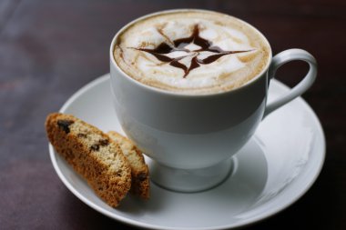 Delicious cappuccino with star design. clipart