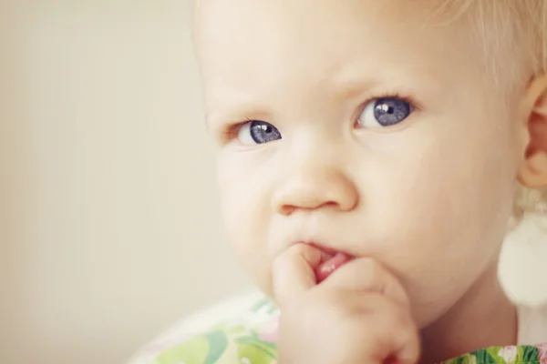 Portrait of a thoughtful looking toddler — Stock Photo, Image
