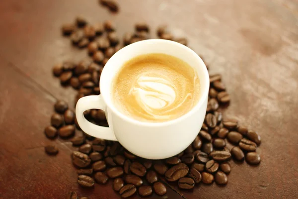 Piccolo latte with a coffee art design. — Stock Photo, Image