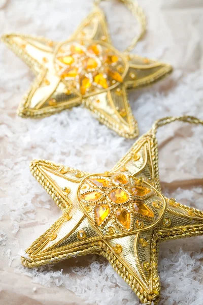Kształt gwiazdy złote ozdoby świąteczne — Zdjęcie stockowe