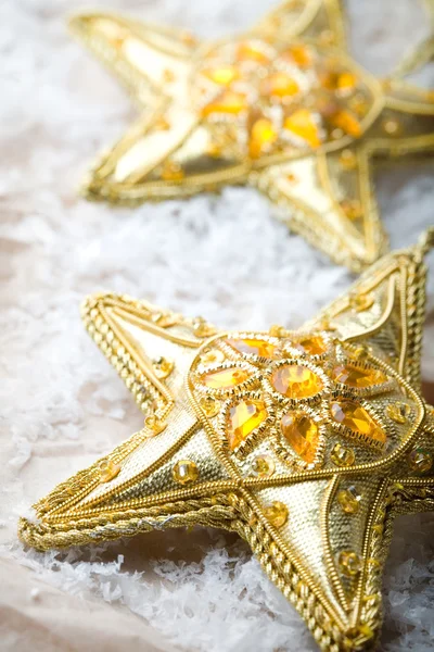Golden star shape Christmas decorations — Stock Photo, Image