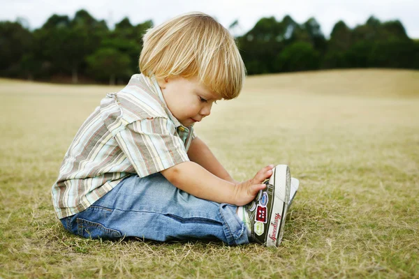 Little boy in a park. — Stock Photo, Image