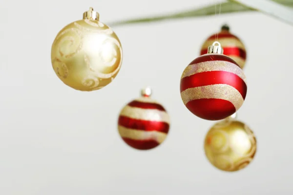 Hanging decorative Christmas baubles. — Stock Photo, Image