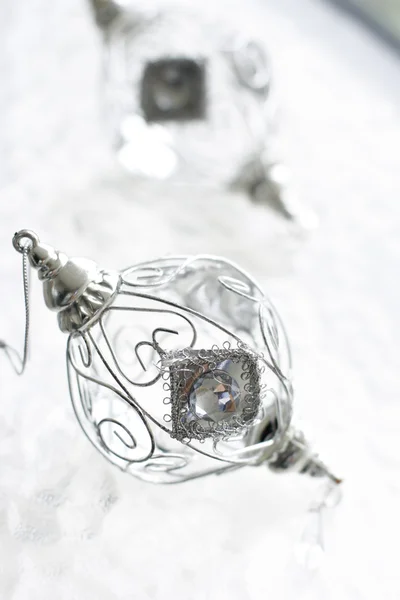 Sparkly silver colored Christmas baubles — Stock Photo, Image