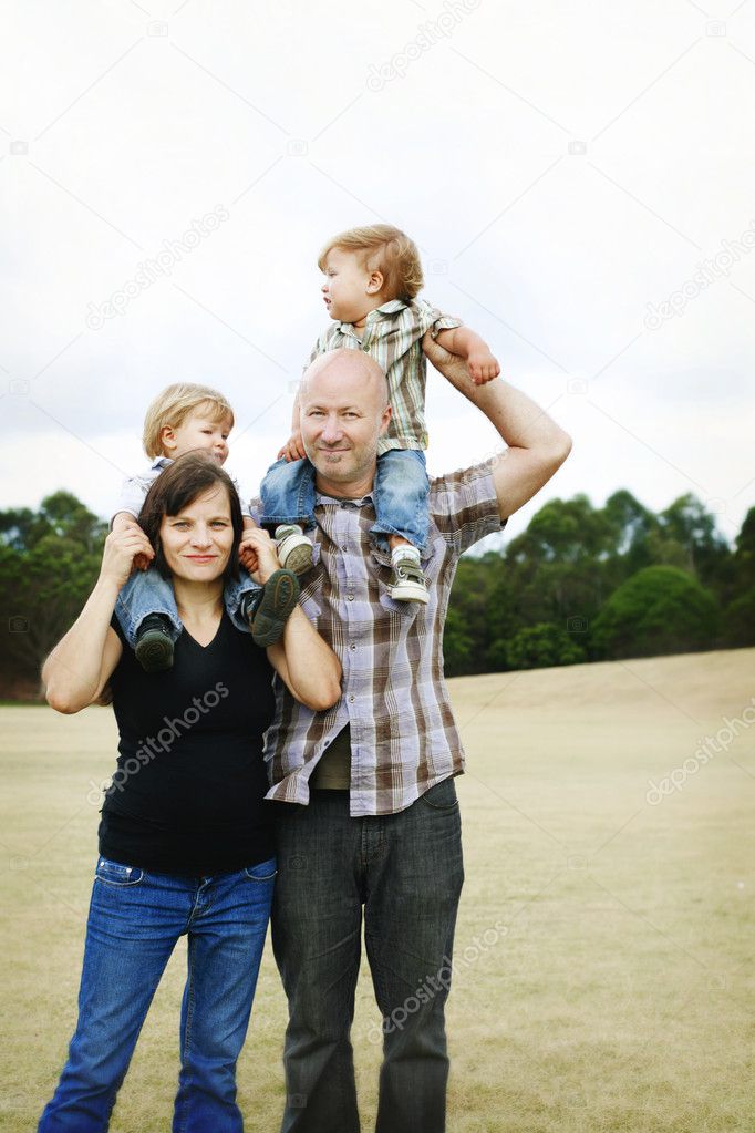 Happy family outdoors.