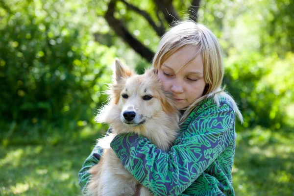 Girl with pet dog — Stock Photo, Image
