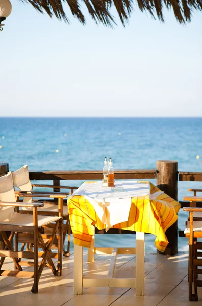 Outdoor restaurant table in Greece — Stock Photo, Image