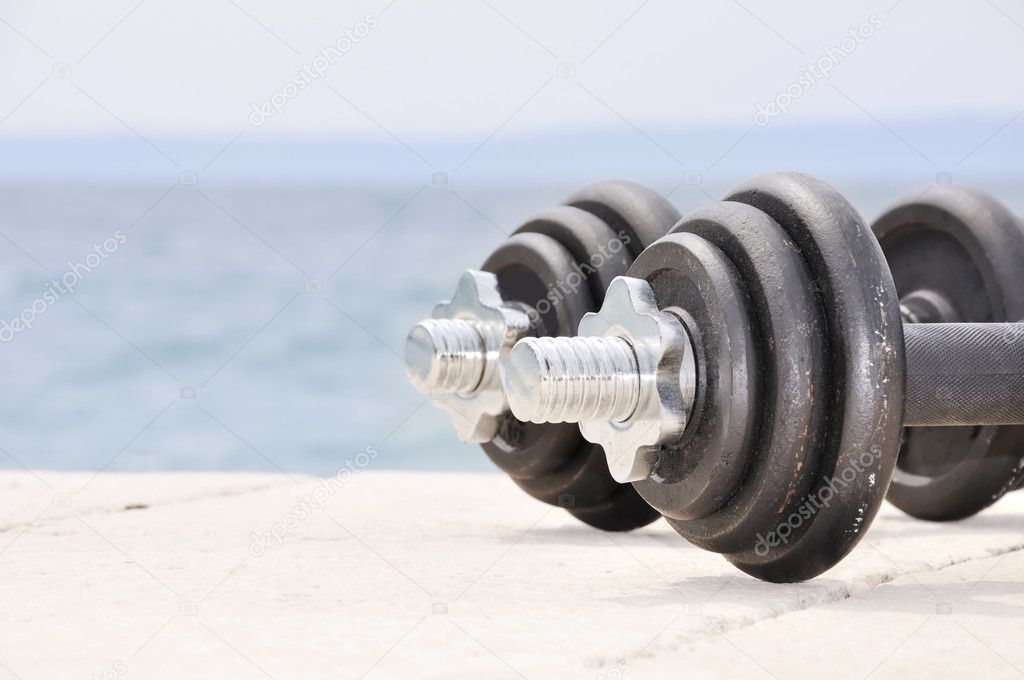 Dumb bells on the beach