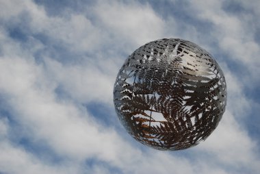 Metal fern ball in the sky clipart