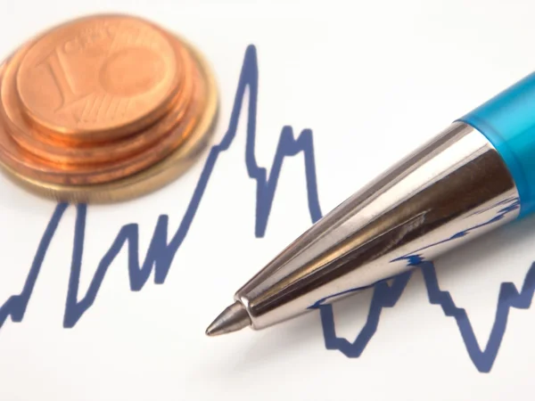 Graph with pen and euro coins — Stock Photo, Image