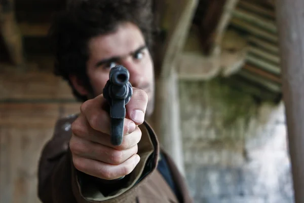 Man pointing gun — Stock Photo, Image