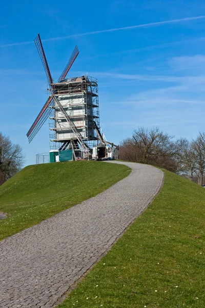 Windmill on hill with path — Stock Photo, Image