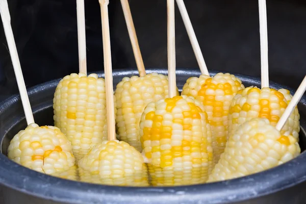 Boiled corn cob sticks