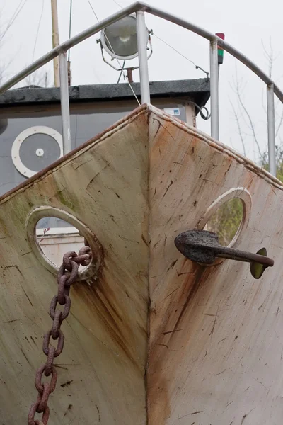 Іржавий човен з якорем Стокове Фото