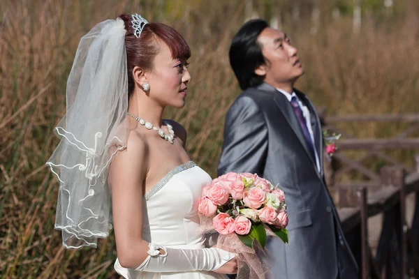 stock image Bride and groom looking up (landscape)