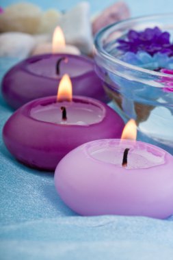 Purple toned candles and flowers (1) clipart