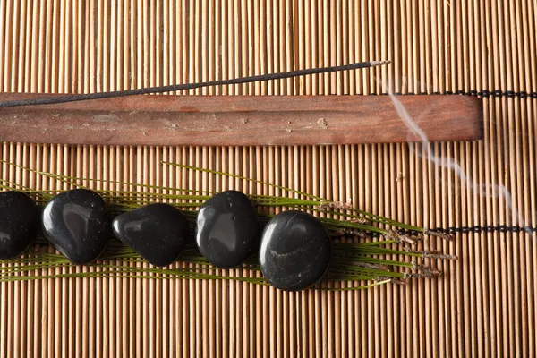 Incense and volcanic hot-stones — Stock Photo, Image