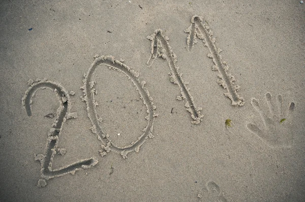 Дата 2011 год в песке — стоковое фото