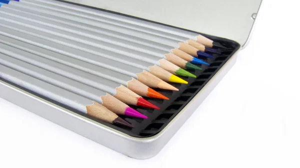 Färgpennor i pencilbox — Stockfoto