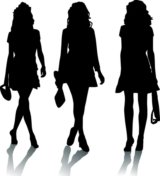 Silhouetten van mode meisjes — Stockvector