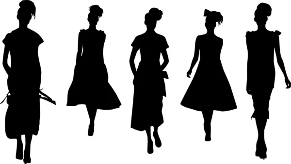 Silhouettes of fashion women — Stock Vector