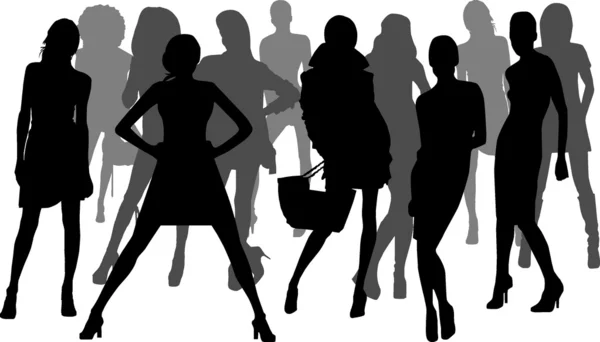 stock vector Silhouettes of fashion girls