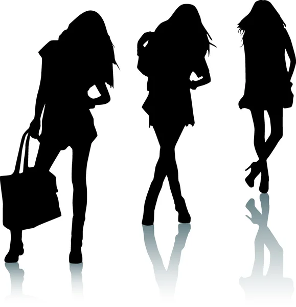 Silhouettes de filles de la mode — Image vectorielle