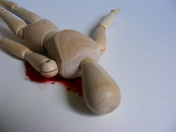 Death of a wooden figure — Stock Photo, Image