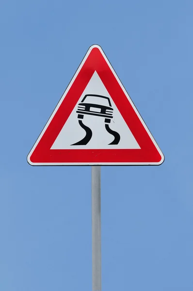Cuidado estrada escorregadia — Fotografia de Stock