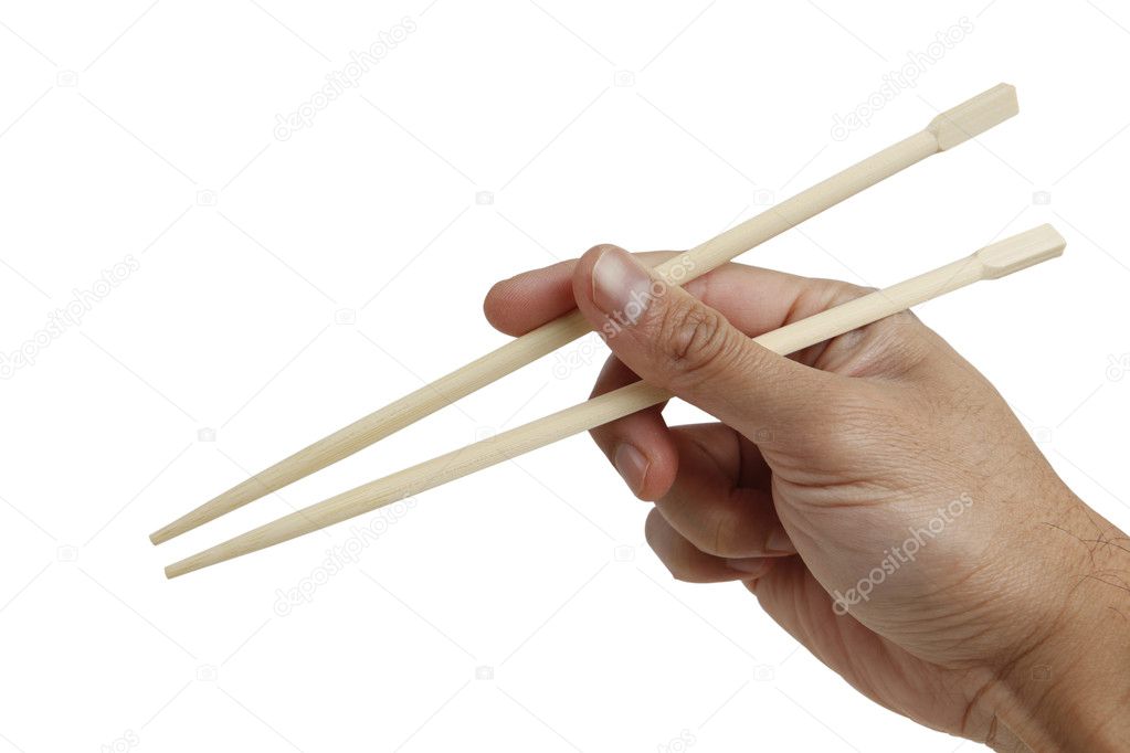 Hand holding chopstick