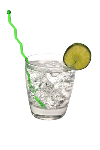 Gin och tonic, lime, swizzle stick — Stockfoto