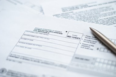 Tax declaration form with pen. clipart