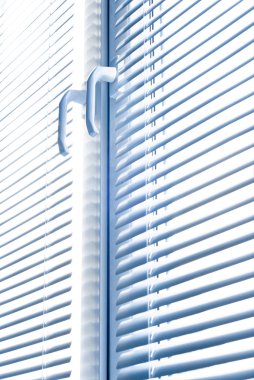 Window with blinds isolated on white. clipart