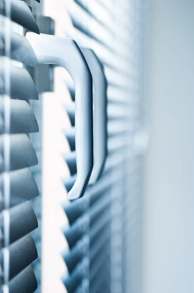 Window handles with neat blinds. — Stock Photo, Image