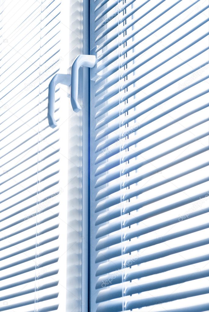 Window with blinds isolated on white.