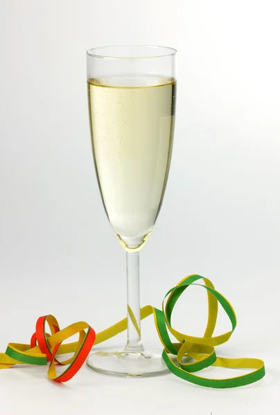Champagne glas en streamer — Stockfoto