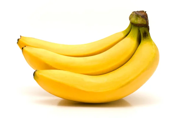 Plátanos frescos sobre un fondo blanco — Foto de Stock