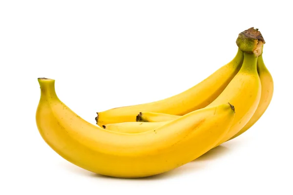 Färska bananer på en vit bakgrund — Stockfoto
