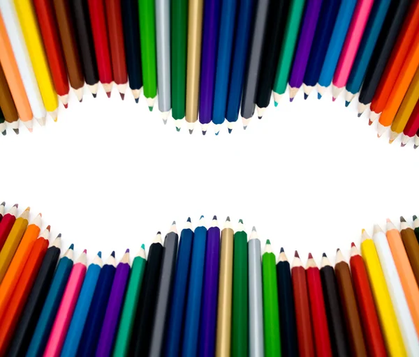 Pencils by a wave — Stock Photo, Image