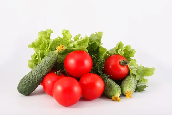 Tomatoes, cucumbers, lettuce — Stock Photo, Image