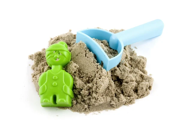 Mold with sand and rake — Stock Photo, Image