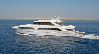 Large motor yacht out at sea clipart