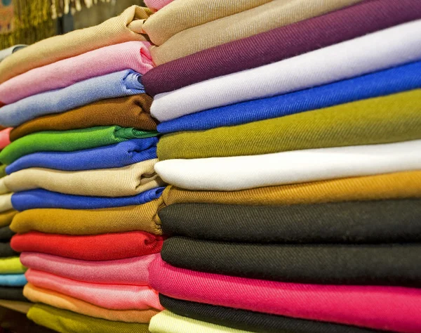 Fabrics on a market stall — Stock Photo, Image